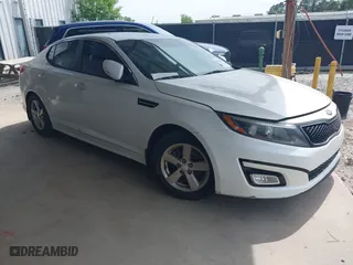 2015 Kia Optima LX with VIN KNAGM4A78F5607679, listed as a IAAI auction lot 42095899 with 125,164 mi miles. Bid and sale history available at carsss.com. Image 1.