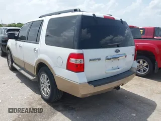 2014 Ford Expedition XLT with VIN 1FMJU1H51EEF11950, listed as a IAAI auction lot 42631473 with 215,572 mi miles and . Bid and sale history available at DreamBid. Image 3.