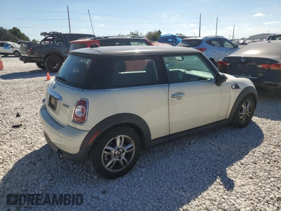 2013 MINI Hardtop with VIN WMWSU3C56DT682857, listed as a Copart auction lot 77677234 with 92,625 mi miles and Clean Title. Bid and sale history available at DreamBid. Image 3.