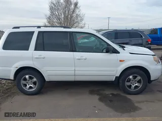 2006 Honda Pilot EX-L with VIN 2HKYF18576H517590, listed as a IAAI auction lot 41802601 with 233,833 mi miles. Bid and sale history available at carsss.com. Image 13.