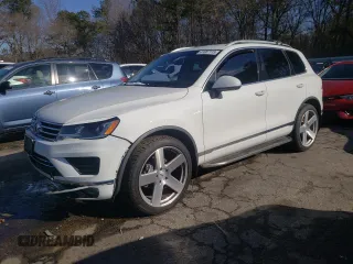 2016 Volkswagen Touareg Sport с VIN WVGEF9BP3GD010930, выставлен на аукционе Copart как лот 41667115 с пробегом Не указан миль и Списание • Salvage title. История ставок и продаж доступна на DreamBid. Изображение 1.