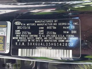 2017 Kia Optima EX with VIN 5XXGU4L35HG142807, listed as a IAAI auction lot 41856251 with 104,634 mi miles. Bid and sale history available at carsss.com. Image 9.