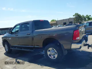 2015 Ram 2500 Tradesman z VIN 3C6TR5CT5FG528294, wystawiony jako IAAI lot #42374966 z przebiegiem Nie podano mil oraz . Historia ofert i sprzedaży dostępna na DreamBid. Obrazek 14.
