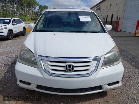 2010 Honda Odyssey EX-L with VIN 5FNRL3H67AB003148, listed as a IAAI auction lot 42244575 with 176,119 mi miles and . Bid and sale history available at DreamBid. Image 6.