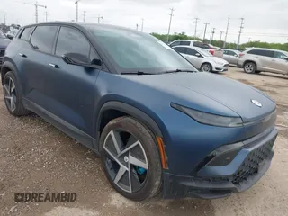 2023 Fisker Ocean One z VIN VCF1ZBU26PG004833, wystawiony jako IAAI lot #42106356 z przebiegiem 12 374 mil mil oraz . Historia ofert i sprzedaży dostępna na DreamBid. Obrazek 1.