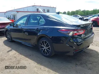 2023 Toyota Camry SE with VIN 4T1G11AK2PU828745, listed as a IAAI auction lot 42193957 with 35,399 mi miles and . Bid and sale history available at carsss.com. Image 3.
