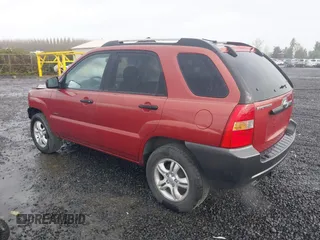 2006 Kia Sportage LX with VIN KNDJE723167159809, listed as a IAAI auction lot 41974464 with 130,822 mi miles and . Bid and sale history available at DreamBid. Image 3.