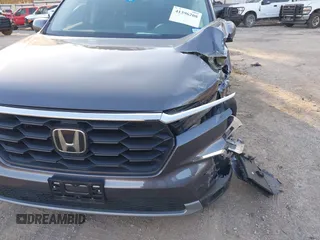 2023 Honda Pilot EX-L with VIN 5FNYG1H5XPB044829, listed as a IAAI auction lot 41396208 with 15,277 mi miles and . Bid and sale history available at DreamBid. Image 18.