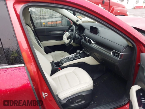 2019 Mazda CX-5 Grand Touring with VIN JM3KFBDM8K0693622, listed as a IAAI auction lot 42503818 with 60,812 mi miles and . Bid and sale history available at DreamBid. Image 5.