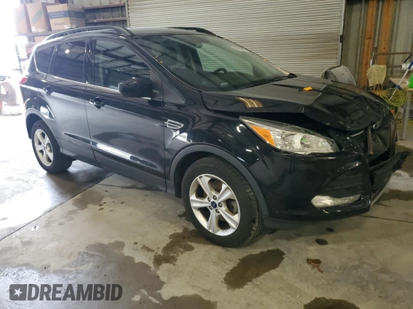 2016 Ford Escape SE with VIN 1FMCU9GX1GUC24692, listed as a Copart auction lot 88102815 with 114,900 mi miles and Salvage Title. Bid and sale history available at DreamBid. Image 4.