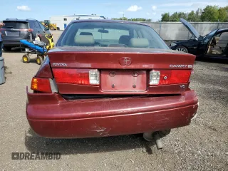 2001 Toyota Camry LE z VIN JT2BF22K610295178, wystawiony jako Copart lot #68538524 z przebiegiem 507 822 mil mil oraz Szkoda całkowita • Salvage title. Historia ofert i sprzedaży dostępna na DreamBid. Obrazek 6.