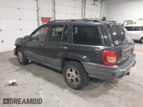 1999 Jeep Grand Cherokee Laredo with VIN 1J4GW58SXXC649579, listed as a IAAI auction lot 42365959 with 199,742 mi miles and . Bid and sale history available at DreamBid. Image 3.