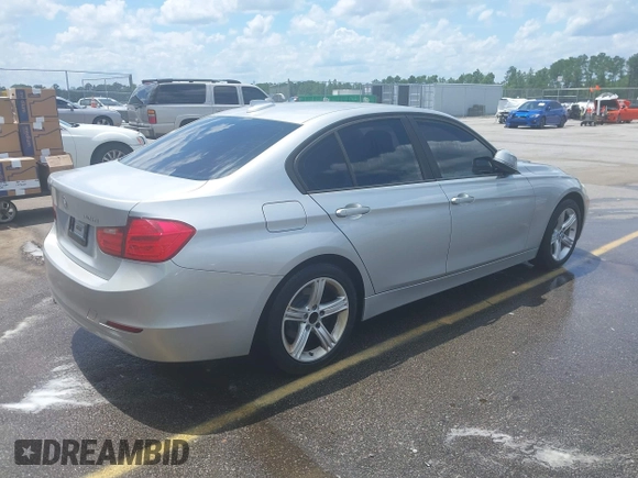 2014 BMW 3 Series 328i with VIN WBA3A5C50EP602200, listed as a IAAI auction lot 42555946 with 93,576 mi miles and . Bid and sale history available at DreamBid. Image 4.