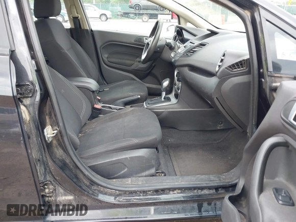 2015 Ford Fiesta SE with VIN 3FADP4BJXFM135864, listed as a IAAI auction lot 39462016 with 113,486 mi miles and . Bid and sale history available at DreamBid. Image 5.