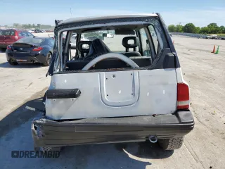 1991 Geo Tracker z VIN 2CNBJ18U3M6909006, wystawiony jako Copart lot #73638944 z przebiegiem 65 033 mil mil oraz Tytuł czysty. Historia ofert i sprzedaży dostępna na DreamBid. Obrazek 6.