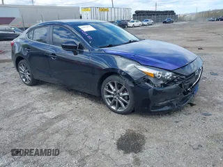 2018 Mazda 3 Touring with VIN 3MZBN1V35JM201844, listed as a IAAI auction lot 42051674 with 75,932 mi miles and . Bid and sale history available at DreamBid. Image 1.
