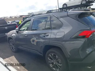 2024 Toyota RAV4 Hybrid XLE Premium with VIN JTMB6RFV2RD138594, listed as a IAAI auction lot 41885310 with 12,330 mi miles. Bid and sale history available at carsss.com. Image 15.