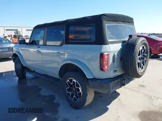 2021 Ford Bronco with VIN 1FMDE5BHXMLB06040, listed as a IAAI auction lot 41490539 with 57,915 mi miles. Bid and sale history available at carsss.com. Image 3.