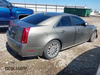 2010 Cadillac CTS with VIN 1G6DK5EV5A0124637, listed as a IAAI auction lot 41731477 with 160,904 mi miles and . Bid and sale history available at DreamBid. Image 4.