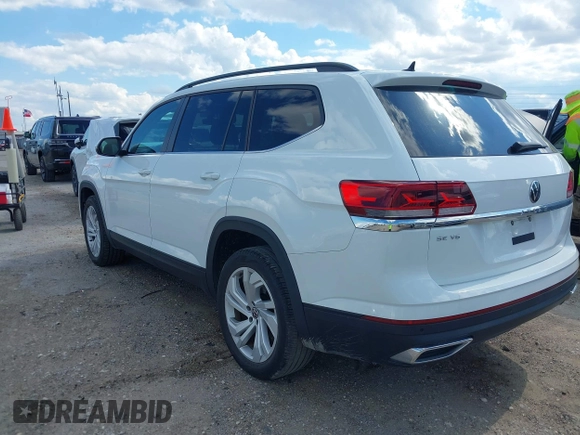 2021 Volkswagen Atlas SE z VIN 1V2WR2CA9MC585700, wystawiony jako IAAI lot #42234502 z przebiegiem 46 040 mil mil oraz . Historia ofert i sprzedaży dostępna na DreamBid. Obrazek 3.