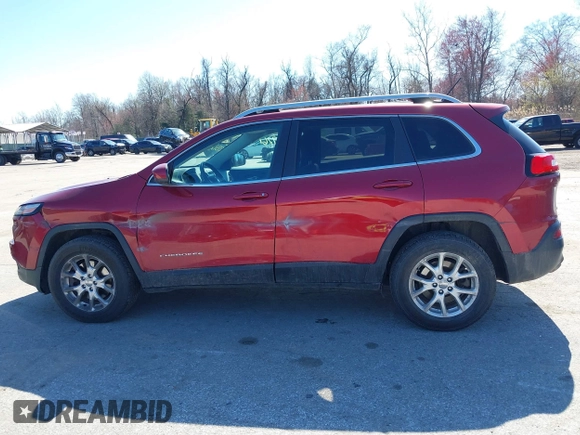 2015 Jeep Cherokee Latitude with VIN 1C4PJMCB6FW714656, listed as a IAAI auction lot 41887261 with 131,600 mi miles and . Bid and sale history available at carsss.com. Image 14.