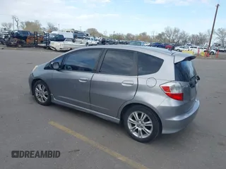 2009 Honda Fit Sport with VIN JHMGE884X9S045470, listed as a IAAI auction lot 41993638 with 181,198 mi miles. Bid and sale history available at carsss.com. Image 3.