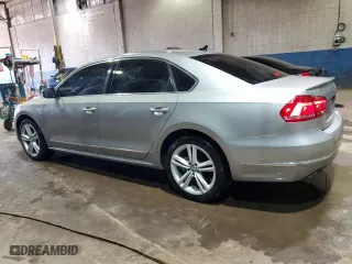 2014 Volkswagen Passat TDI SE w/Sunroof with VIN 1VWBN7A34EC001621, listed as a Copart auction lot 49226945 with 89,267 mi miles and Clean Title. Bid and sale history available at carsss.com. Image 2.