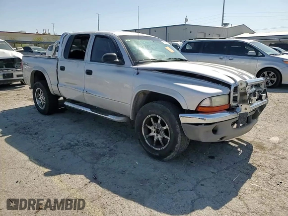 2004 Dodge Dakota SLT with VIN 1D7HG48N74S509797, listed as a Copart auction lot 57797055 with 214,275 mi miles and Salvage title. Bid and sale history available at DreamBid. Image 13.