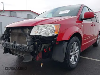 2014 Dodge Grand Caravan SXT with VIN 2C4RDGCG3ER257695, listed as a IAAI auction lot 41534568 with 116,896 mi miles and . Bid and sale history available at DreamBid. Image 20.