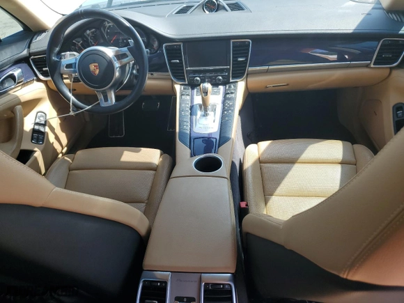 2016 Porsche Panamera 4 with VIN WP0AA2A79GL000127, listed as a Copart auction lot 56220614 with 76,065 mi miles and Salvage Title. Bid and sale history available at carsss.com. Image 8.