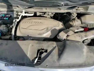 2024 Honda Odyssey Touring z VIN 5FNRL6H85RB018455, wystawiony jako Copart lot #86835955 z przebiegiem 52 165 mil mil oraz Szkoda całkowita • Salvage title. Historia ofert i sprzedaży dostępna na DreamBid. Obrazek 14.