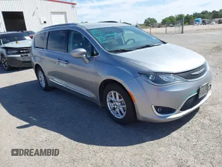 2020 Chrysler Pacifica Touring L with VIN 2C4RC1BG4LR272446, listed as a IAAI auction lot 42140656 with 100,771 mi miles and . Bid and sale history available at DreamBid. Image 1.