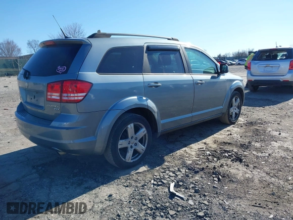 2010 Dodge Journey SXT with VIN 3D4PH5FVXAT107023, listed as a IAAI auction lot 41747572 with 165,568 mi miles and . Bid and sale history available at DreamBid. Image 4.