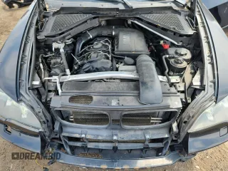 2012 BMW X5 35i with VIN 5UXZV4C5XCL765757, listed as a Copart auction lot 64497535 with 178,836 mi miles and Salvage title. Bid and sale history available at DreamBid. Image 12.