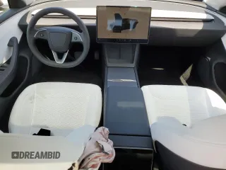 2025 Tesla Model 3 Long Range with VIN 5YJ3E1EA8SF918928, listed as a Copart auction lot 53454155 with 2,061 mi miles and Salvage title. Bid and sale history available at DreamBid. Image 8.