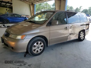 2003 Honda Odyssey EX-L with VIN 5FNRL18963B087397, listed as a Copart auction lot 62392415 with 261,737 mi miles and Salvage title. Bid and sale history available at DreamBid. Image 1.