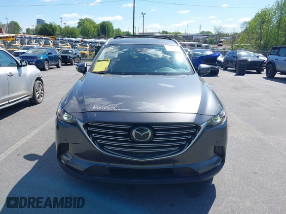 2021 Mazda CX-9 Touring with VIN JM3TCACY7M0503484, listed as a IAAI auction lot 42013262 with 63,777 mi miles and . Bid and sale history available at DreamBid. Image 13.