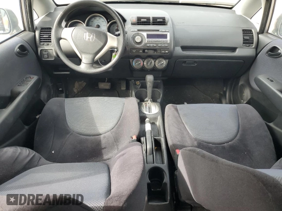 2007 Honda Fit z VIN JHMGD38477S043937, wystawiony jako Copart lot #58495495 z przebiegiem 101 800 mil mil oraz Szkoda całkowita • Salvage title. Historia ofert i sprzedaży dostępna na DreamBid. Obrazek 8.