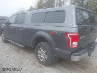 2015 Ford F-150 XLT w/HD Payload Pkg with VIN 1FTFW1EG6FFA46006, listed as a IAAI auction lot 41942359 with 144,221 mi miles. Bid and sale history available at carsss.com. Image 3.