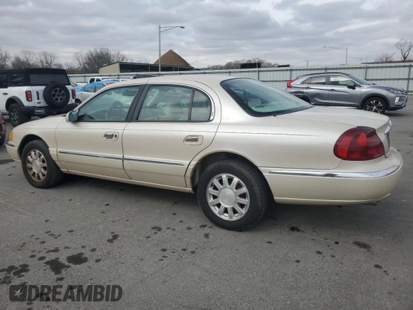 2001 Lincoln Continental z VIN 1LNHM97V71Y711352, wystawiony jako Copart lot #46235305 z przebiegiem 122 786 mil mil oraz Szkoda całkowita • Salvage title. Historia ofert i sprzedaży dostępna na DreamBid. Obrazek 2.