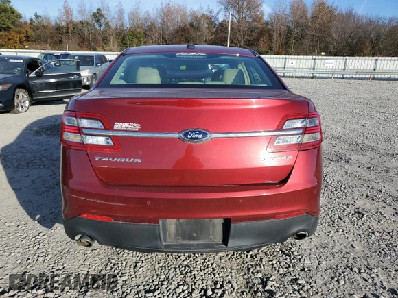 2014 Ford Taurus Limited with VIN 1FAHP2F81EG183128, listed as a Copart auction lot 82409384 with 107,624 mi miles and Salvage title. Bid and sale history available at DreamBid. Image 6.