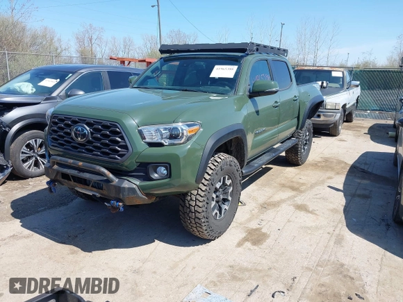 2021 Toyota Tacoma 4WD SR with VIN 3TMCZ5ANXMM382874, listed as a IAAI auction lot 41965388 with 62,178 mi miles. Bid and sale history available at carsss.com. Image 18.