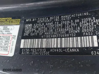 2007 Toyota Camry CE with VIN 4T1BE46K77U688152, listed as a IAAI auction lot 41799406 with 152,033 mi miles. Bid and sale history available at carsss.com. Image 9.