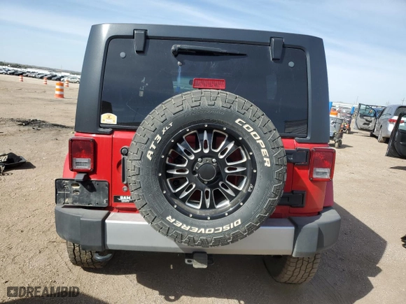2014 Jeep Wrangler Unlimited Sahara with VIN 1C4BJWEG3EL101635, listed as a Copart auction lot 73589194 with 143,843 mi miles and Salvage Title. Bid and sale history available at carsss.com. Image 6.