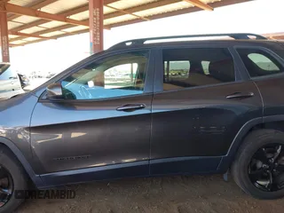 2016 Jeep Cherokee Latitude with VIN 1C4PJLCS4GW184621, listed as a IAAI auction lot 42007342 with 120,609 mi miles and . Bid and sale history available at DreamBid. Image 14.