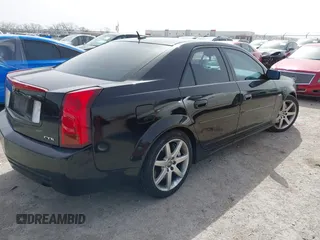 2006 Cadillac CTS-V with VIN 1G6DN57U360202173, listed as a IAAI auction lot 41752800 with 201,991 mi miles. Bid and sale history available at carsss.com. Image 4.