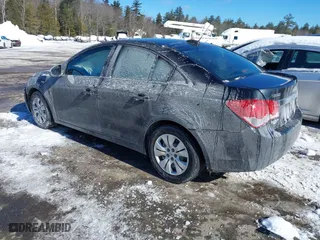 2015 Chevrolet Cruze LS with VIN 1G1PA5SG8F7191999, listed as a IAAI auction lot 41555183 with 103,567 mi miles. Bid and sale history available at carsss.com. Image 3.