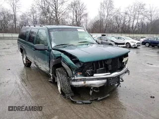 1995 GMC Suburban z VIN 1GKFK16K0SJ748087, wystawiony jako Copart lot #85121834 z przebiegiem 191 550 mil mil oraz Szkoda całkowita • Salvage title. Historia ofert i sprzedaży dostępna na DreamBid. Obrazek 12.