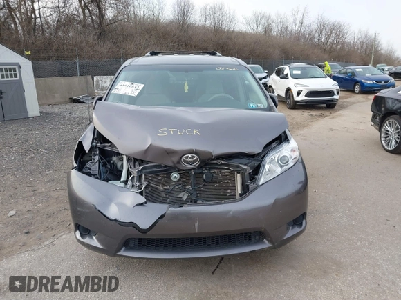 2014 Toyota Sienna LE with VIN 5TDJK3DC1ES087626, listed as a IAAI auction lot 41610813 with 142,311 mi miles and . Bid and sale history available at DreamBid. Image 12.