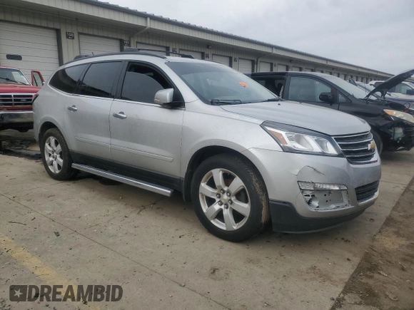 2016 Chevrolet Traverse LT with VIN 1GNKRGKD2GJ148251, listed as a Copart auction lot 56477355 with 130,931 mi miles and Salvage title. Bid and sale history available at DreamBid. Image 4.